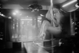 A pole dancer practiced in a bar in Moscow, 2000